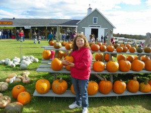 Posing with a pumpkin