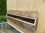 Coop nesting box opening