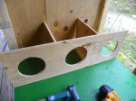 Three nesting boxes framed in