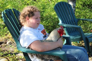 Hannah and our rooster the Colonel