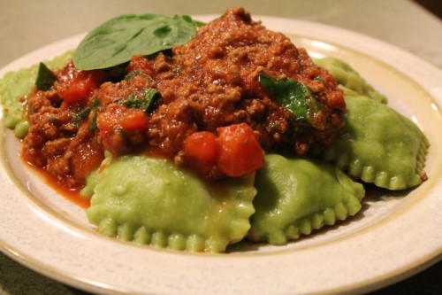 Hannah's handmade spinach ravioli with meat sauce