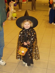 a little witch at Halloween