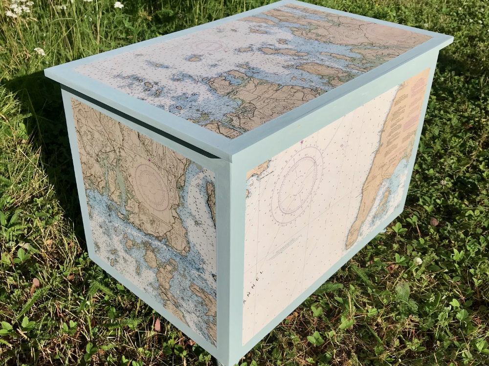 coffee table decoupaged with nautical charts