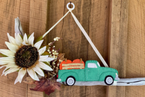 Autumn decoration on drift wood felt truck